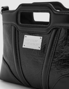 Embossed Vegan Leather Shoulder Bag sold by Urban Revivo