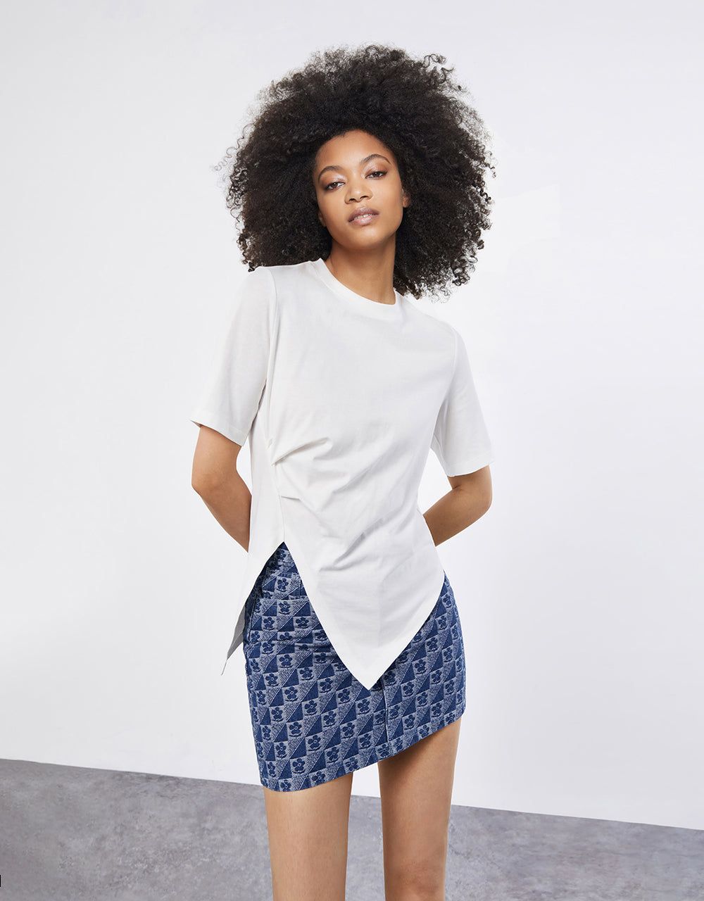 Asymmetrical Hem T-Shirt sold by Urban Revivo