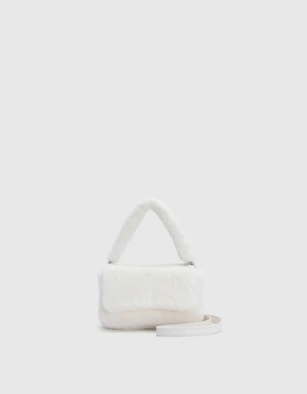 Chained Furry Shoulder Bag sold by Urban Revivo