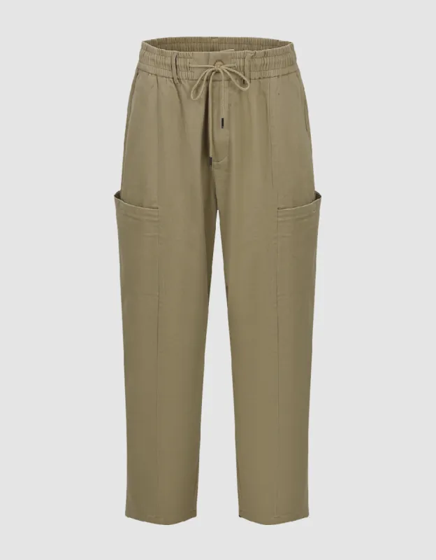 Drawstring Waist Carrot Fit Pants sold by Urban Revivo