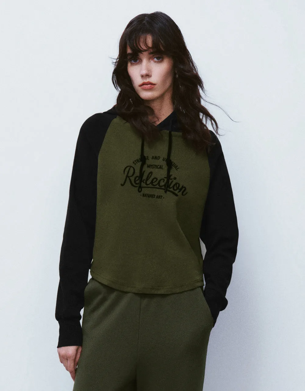 Raglan Sleeve Hooded Sweatshirt sold by Urban Revivo