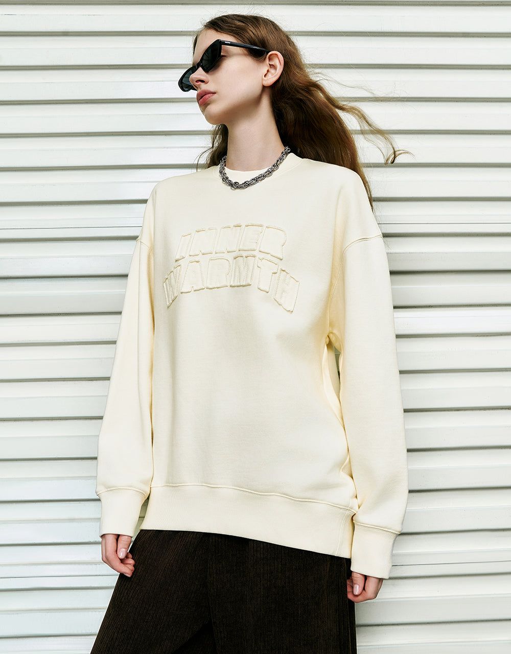 Letter Embossed Crew Neck Loose Sweatshirt sold by Urban Revivo