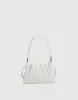 Textured Shoulder Bag With Stand Handle sold by Urban Revivo