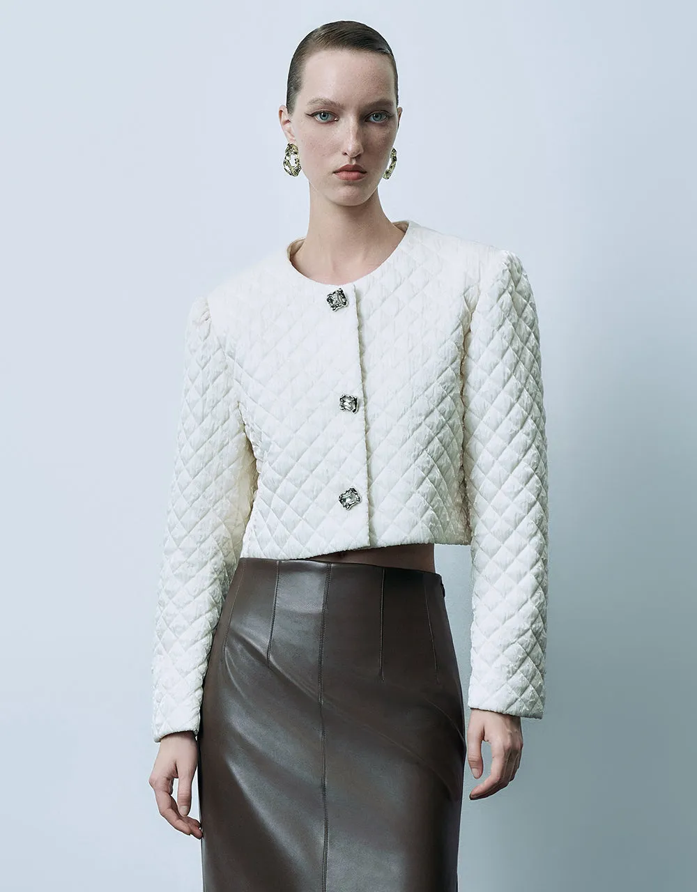 Embossed U Neck Padded Coat sold by Urban Revivo