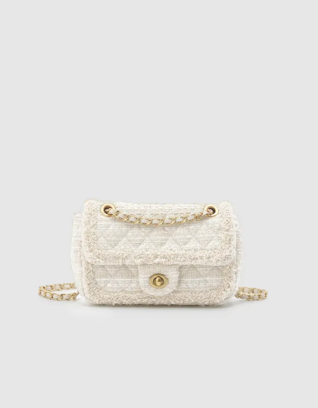 Raw Trim Quilted Flap Shoulder Bag sold by Urban Revivo