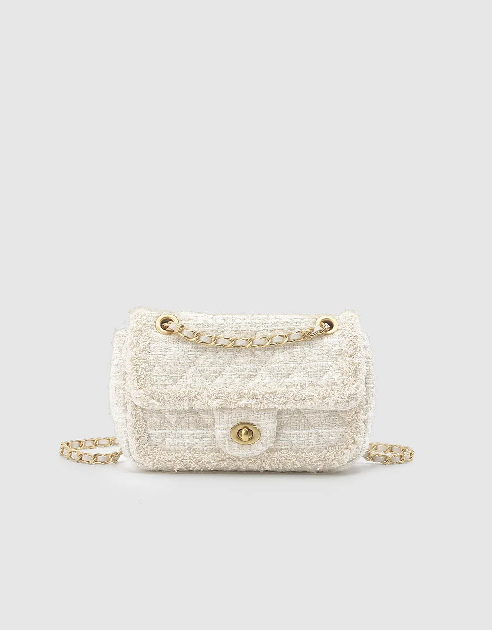 Raw Trim Quilted Flap Shoulder Bag sold by Urban Revivo