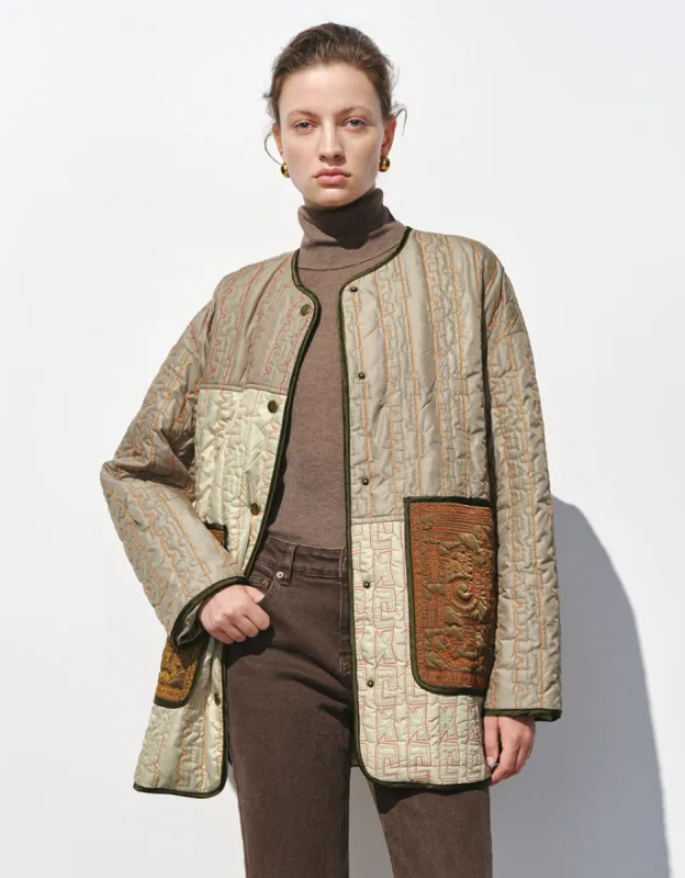 Embossed U Neck Padded Coat sold by Urban Revivo