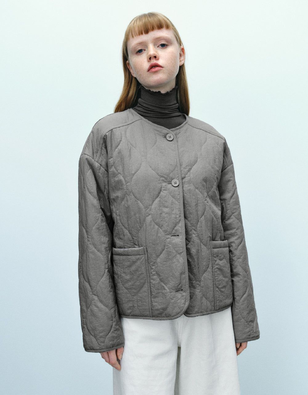 Embossed Straight Padded Coat sold by Urban Revivo