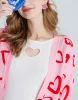Heart Pattern Jacquard Button Up Oversized Cardigan sold by Urban Revivo