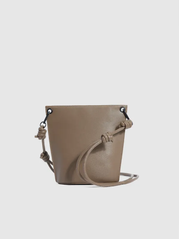 Vegan Leather Crossbody Bag With Knot Strap sold by Urban Revivo