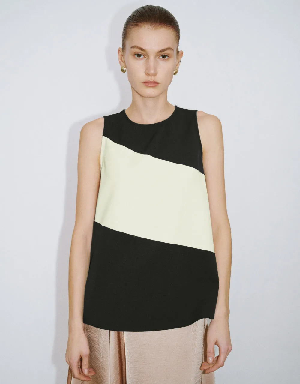 Striped Crew Neck Knitted Tank Top sold by Urban Revivo