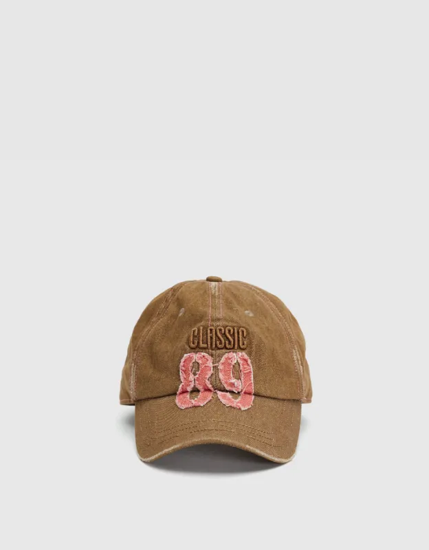 Letter Embossed Baseball Cap sold by Urban Revivo