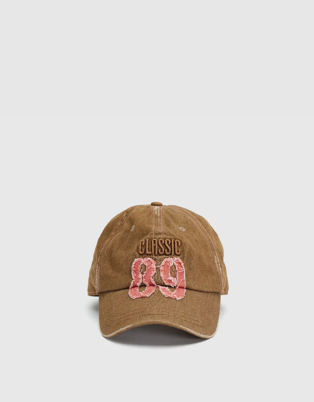 Letter Embossed Baseball Cap sold by Urban Revivo