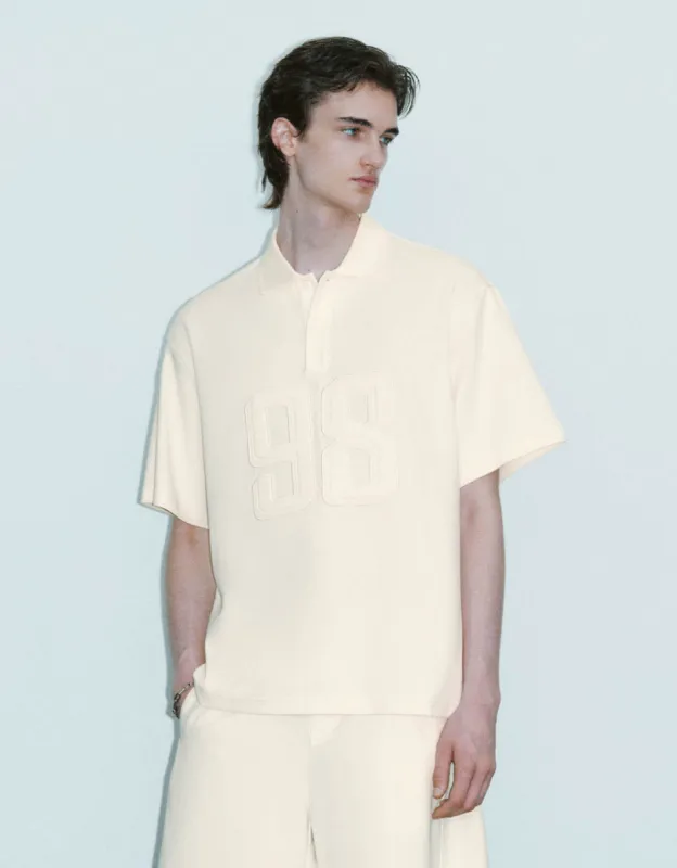 Embossed Loose Polo Shirt sold by Urban Revivo