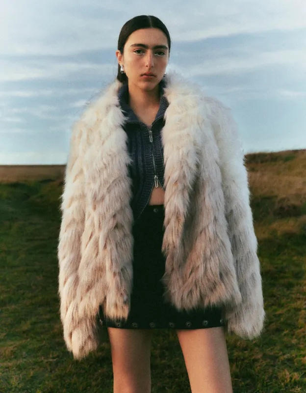 Loose Furry Coat sold by Urban Revivo