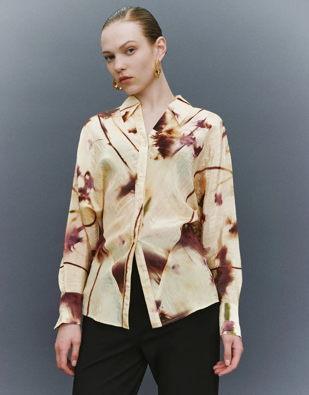 Printed Dolman Sleeve Skater Shirt sold by Urban Revivo