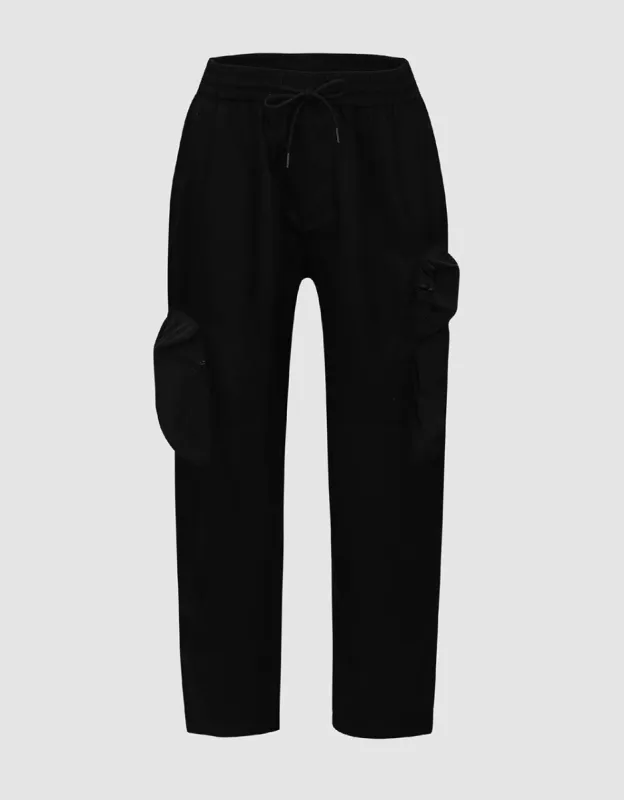 Drawstring Waist Carrot Fit Pants sold by Urban Revivo