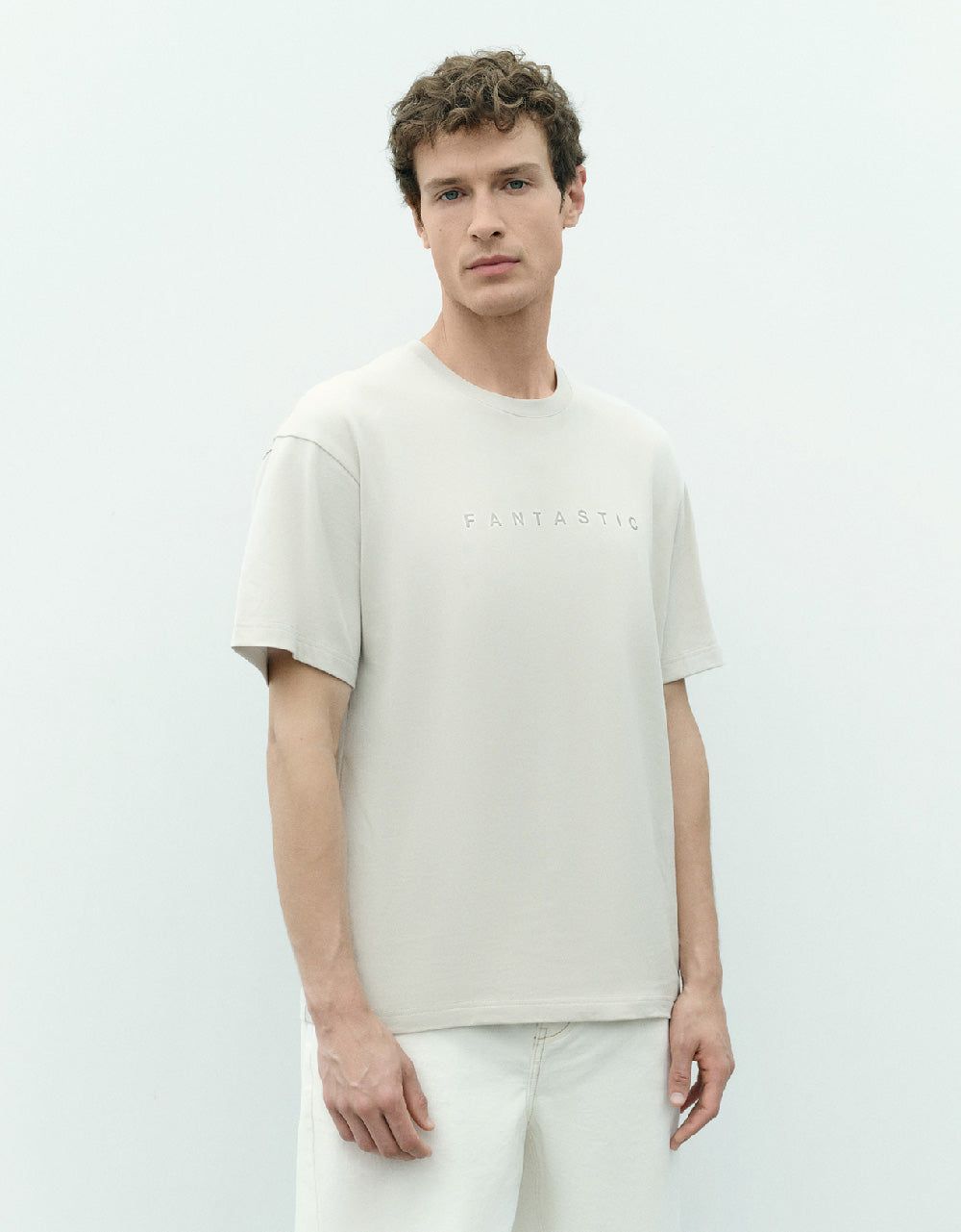 Letter Embossed Crew Neck T-Shirt sold by Urban Revivo