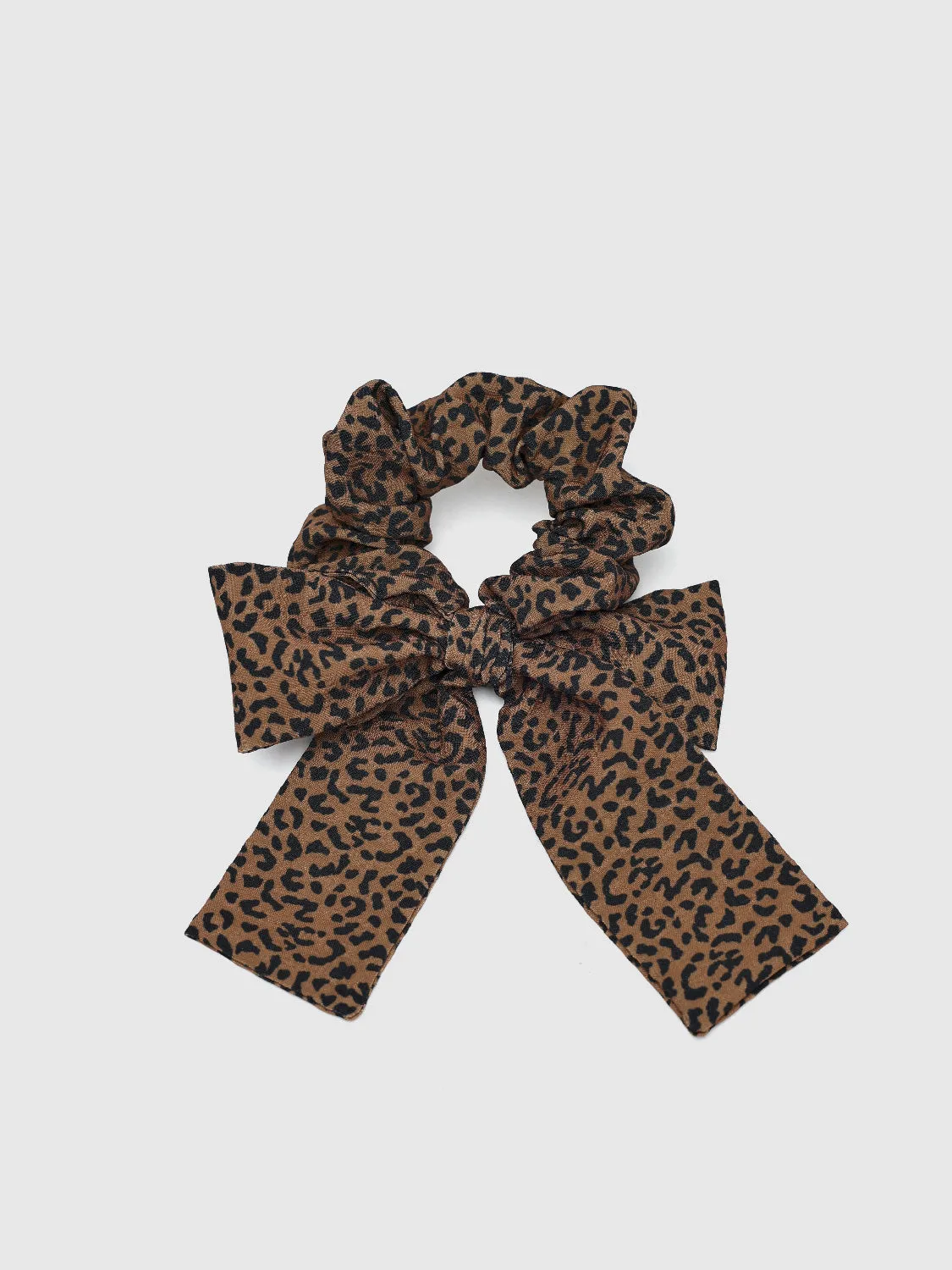 Leopard Printed Bow Hair Band sold by Urban Revivo