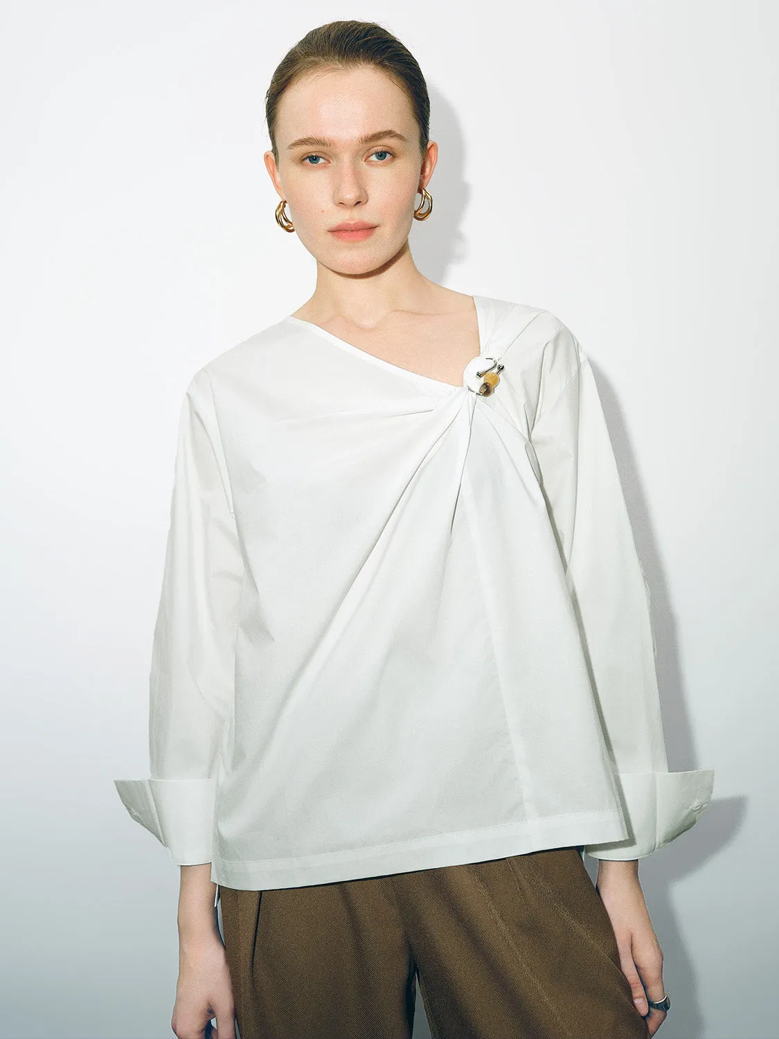 Asymmetric Twist Loose Blouse sold by Urban Revivo