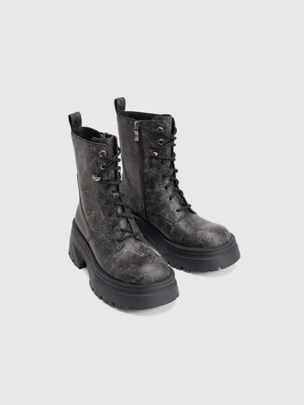 Distressed Round Toe Booties sold by Urban Revivo
