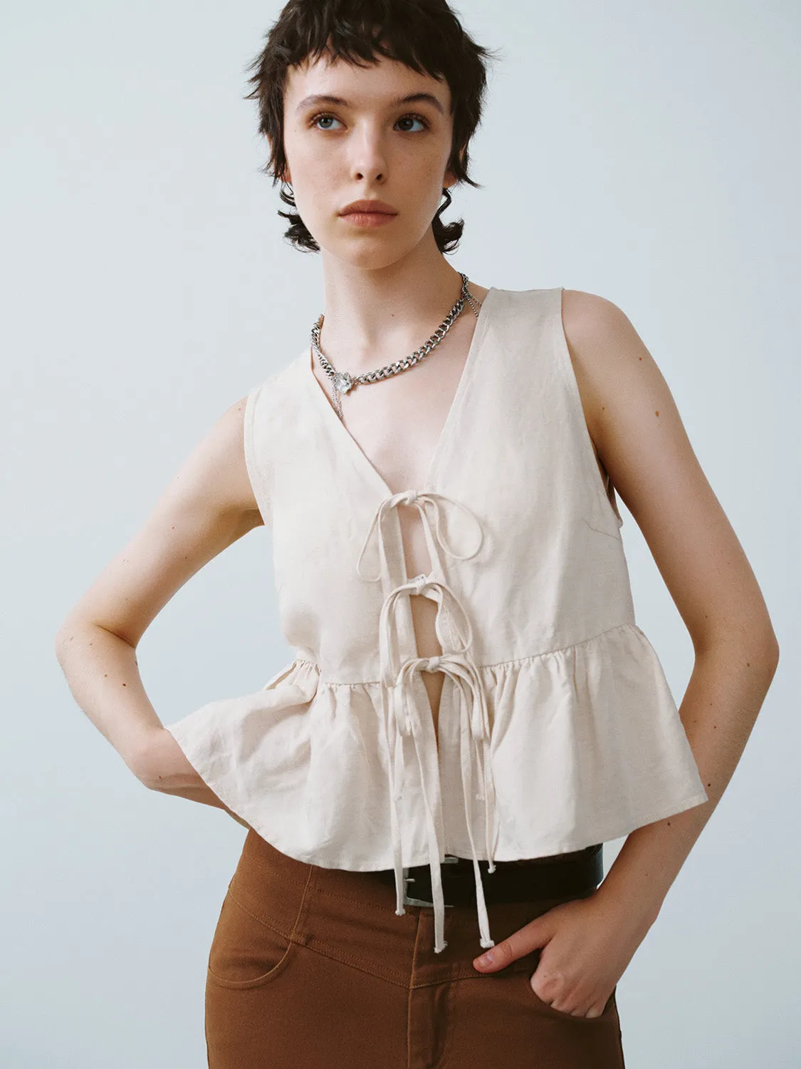 Sleeveless Tie Front V-Neck Shirt sold by Urban Revivo