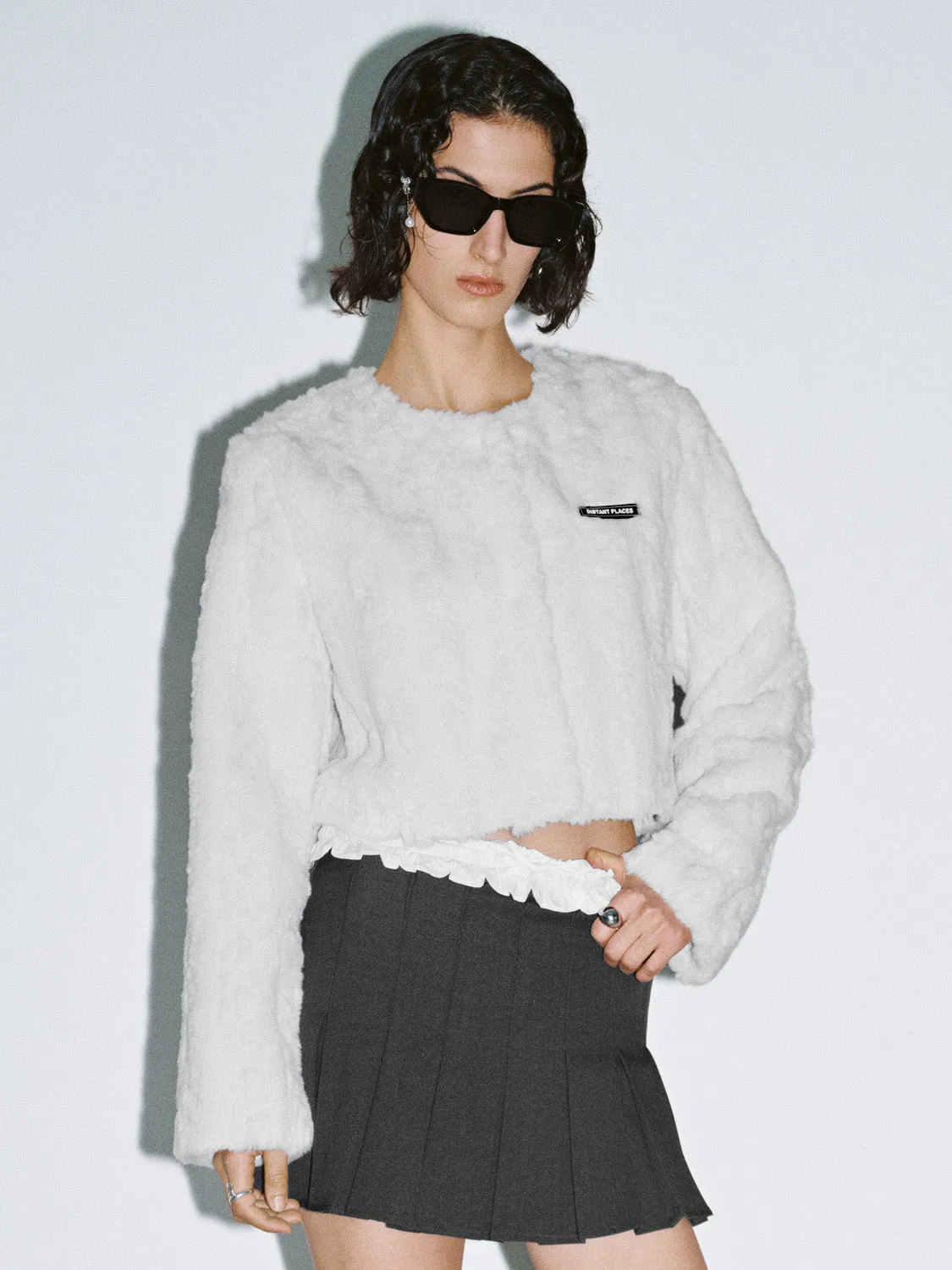 Regular Fur Coats sold by Urban Revivo