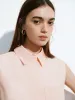 Cropped Sleeveless Overhead Shirt sold by Urban Revivo
