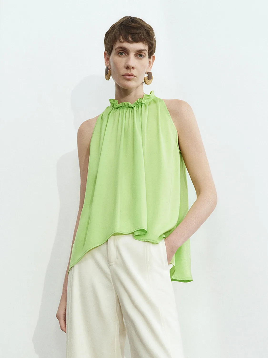 Sleeveless Ruffle Tie Blouses sold by Urban Revivo