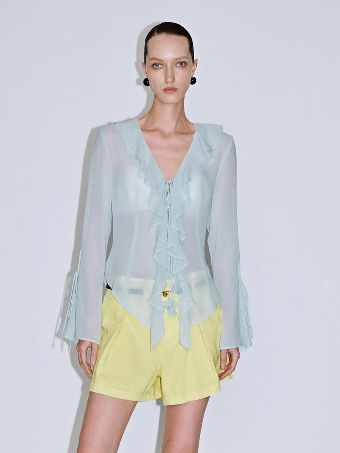 Sheer Ruffle Hem Blouses sold by Urban Revivo