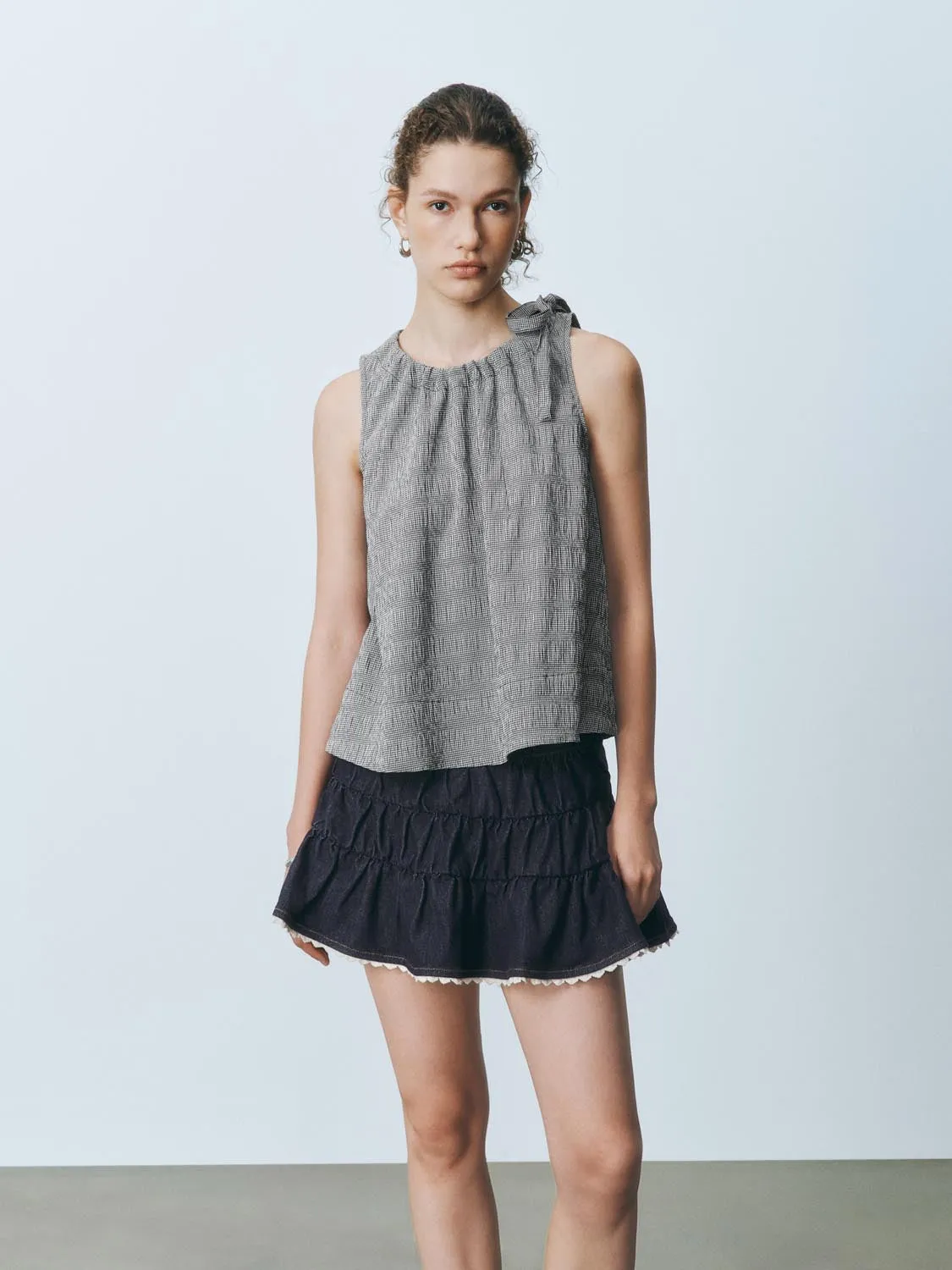 Checkered Sleeveless Overhead Shirt sold by Urban Revivo
