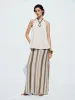 Halter Neck Overhead Vests sold by Urban Revivo