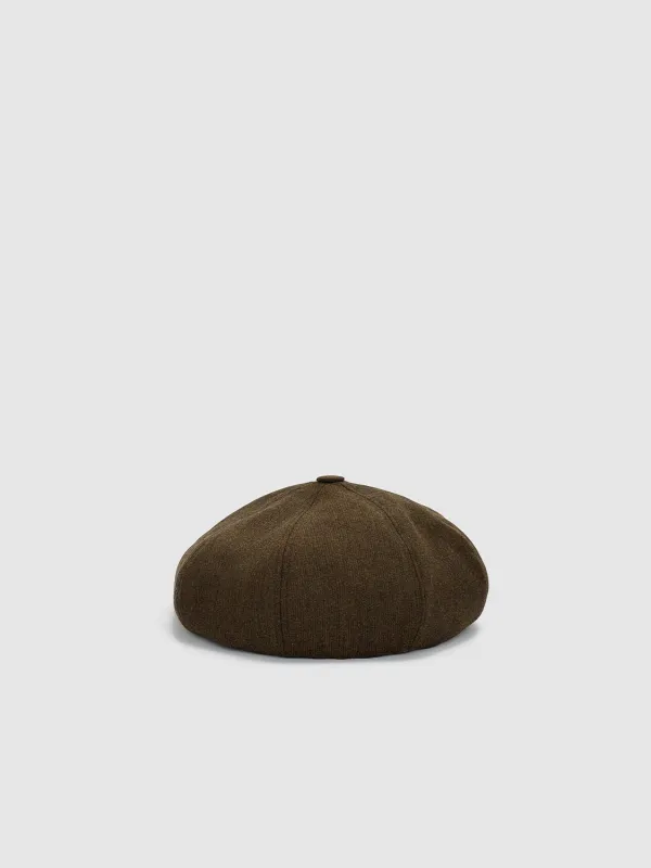 Brimless Skull Cap sold by Urban Revivo