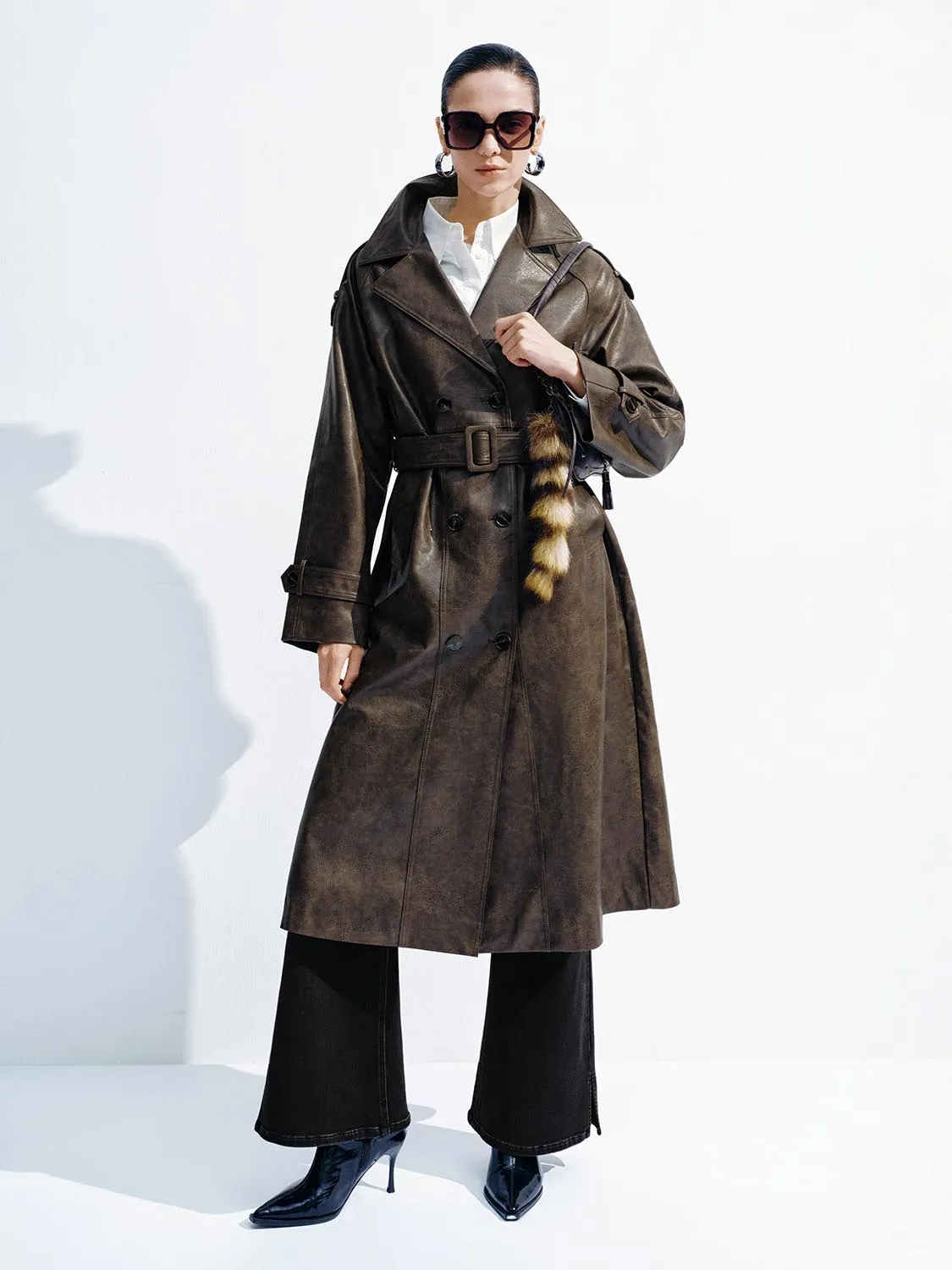 Faux Leather Belted Oversize Trench Coats sold by Urban Revivo