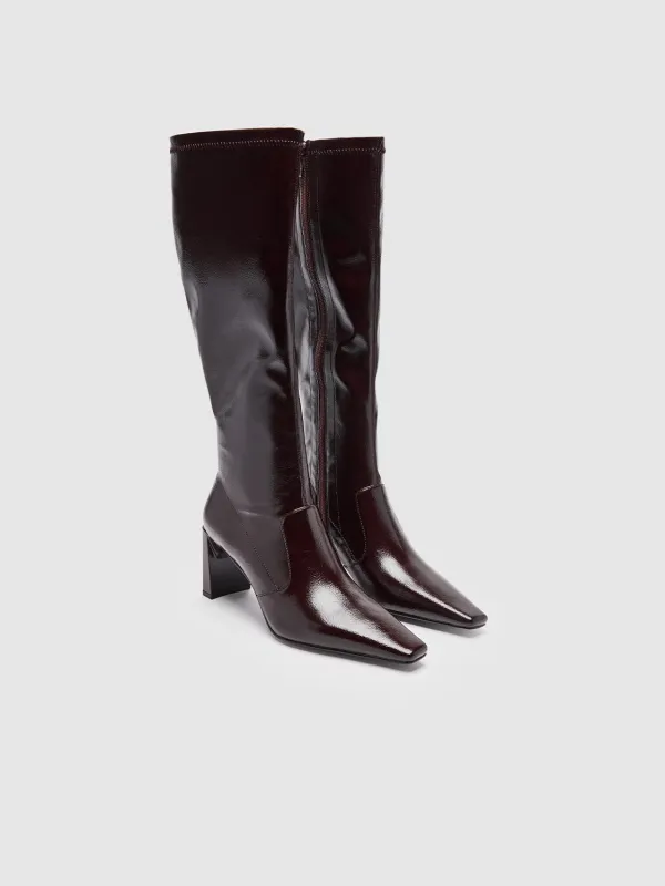 Point Toe Heeled Knee Boots sold by Urban Revivo