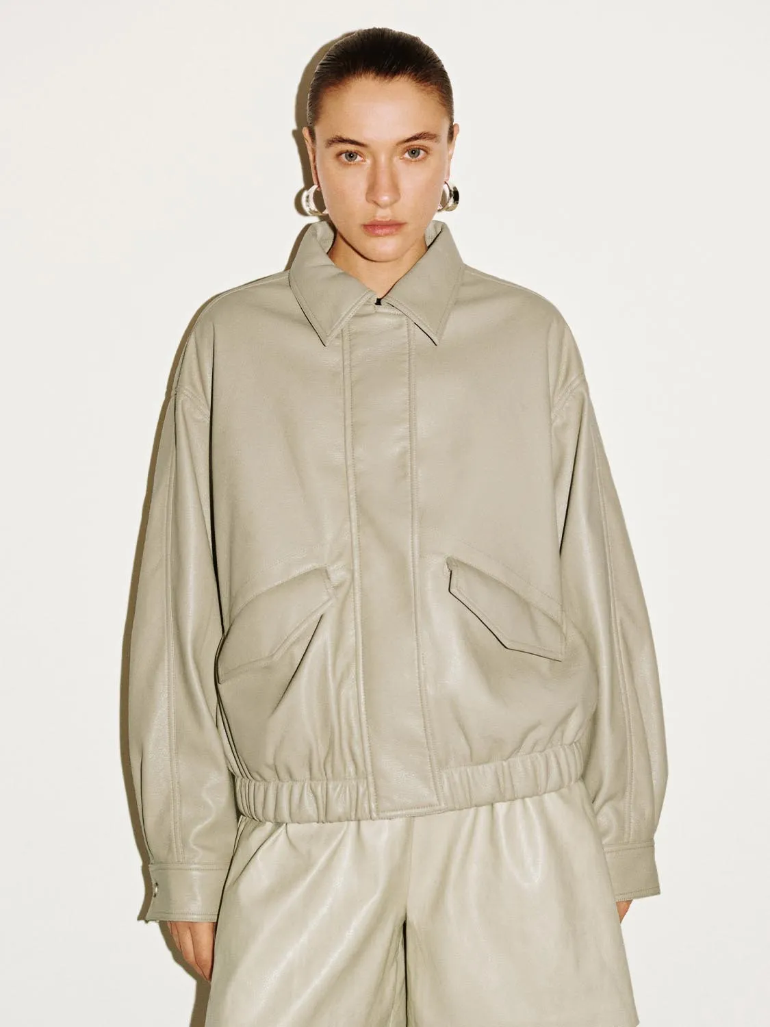 Faux Leather Concealed Button Bomber Jackets sold by Urban Revivo