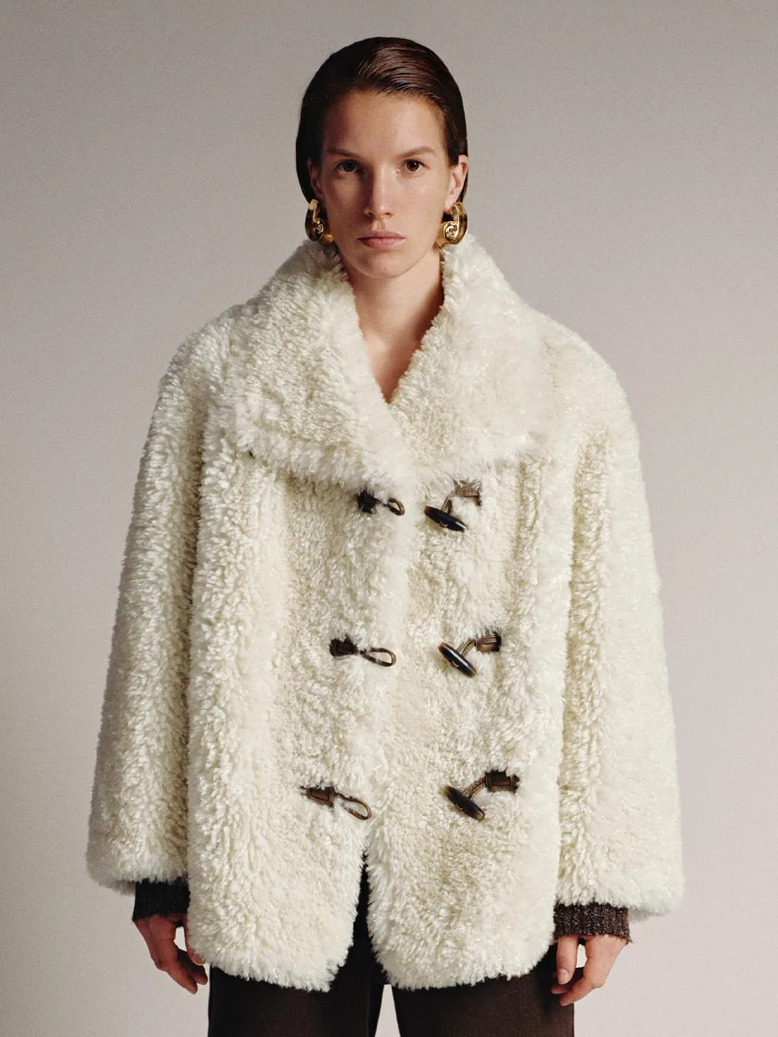 Collared Sherpa Fleece Toggle Jackets sold by Urban Revivo