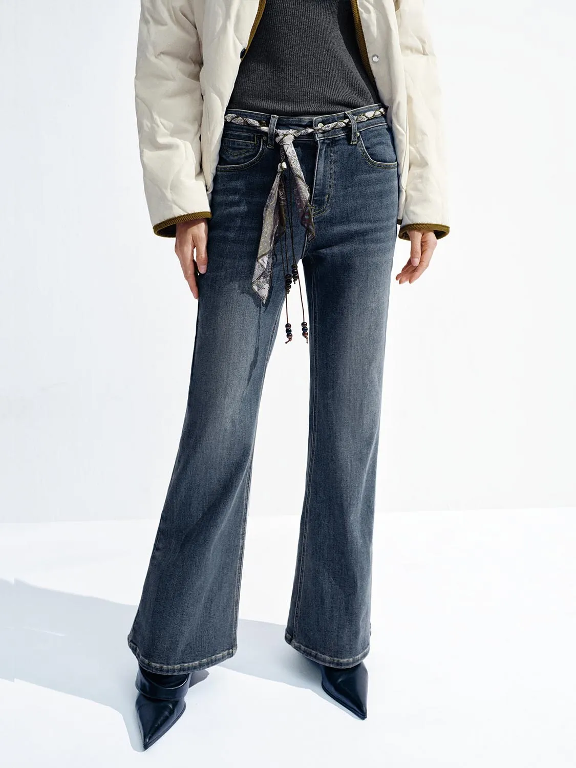 Belted Flare Leg Jeans sold by Urban Revivo