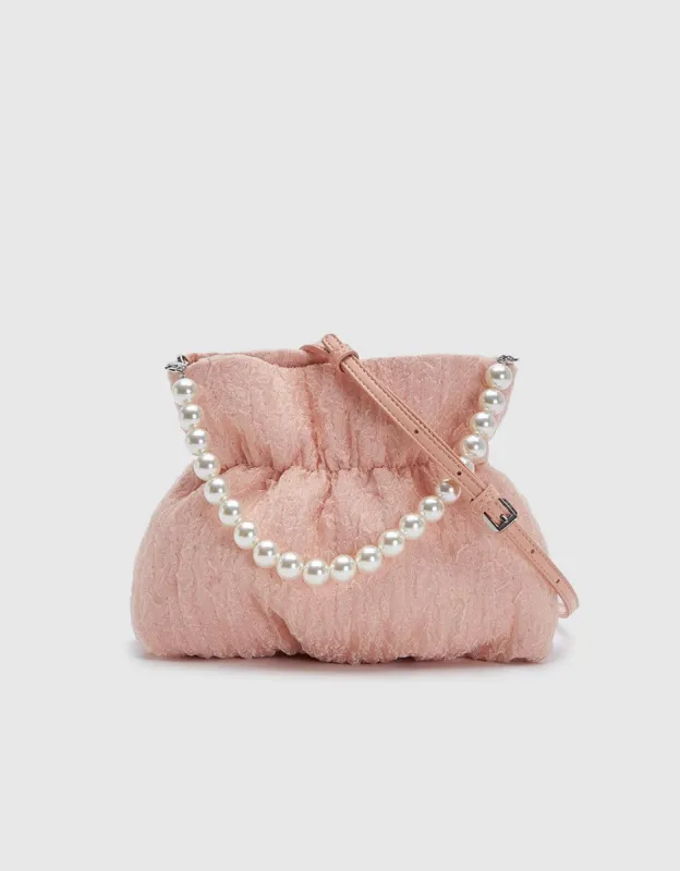 Textured Ruched Shoulder Bag sold by Urban Revivo