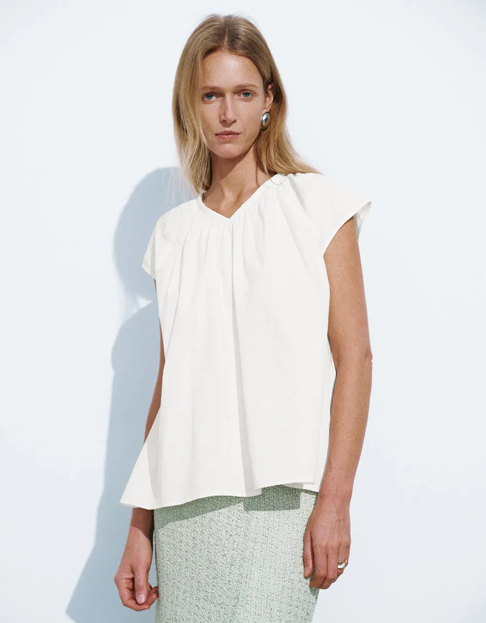 Sleeveless Loose V-Neck Shirt sold by Urban Revivo