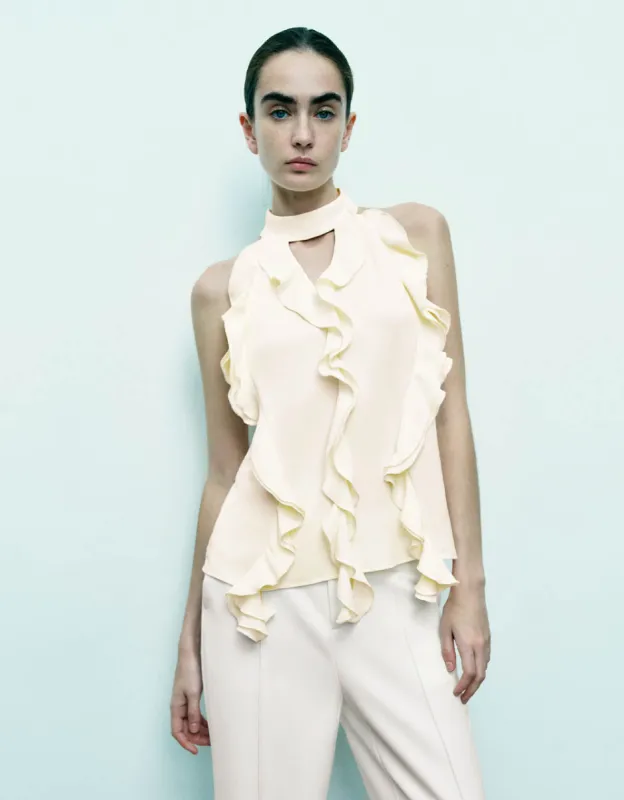 Halter Neck Ruffle Sleeveless Blouse sold by Urban Revivo