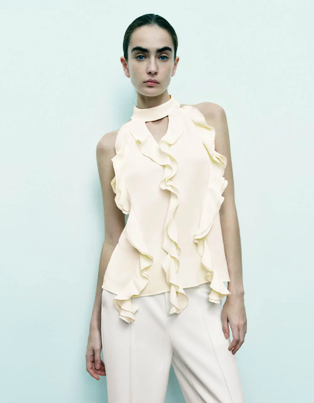 Halter Neck Ruffle Sleeveless Blouse sold by Urban Revivo