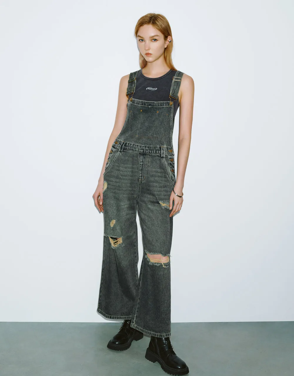 Ripped Denim Jumpsuit sold by Urban Revivo