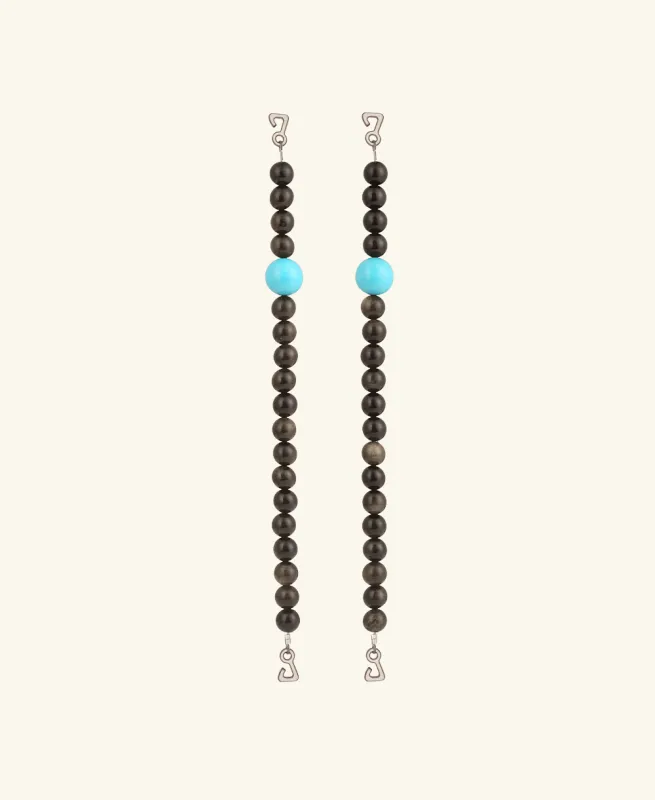 Trinidad obsidian straps sold by DOLLA