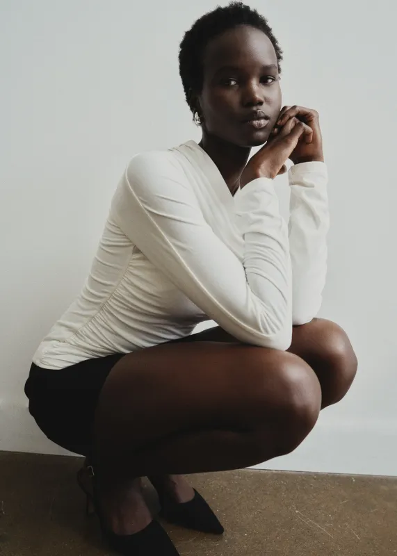 Nomi Top sold by RE ONA