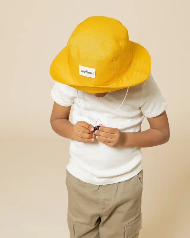 Linen bucket hat by Caribou sold by atelier b