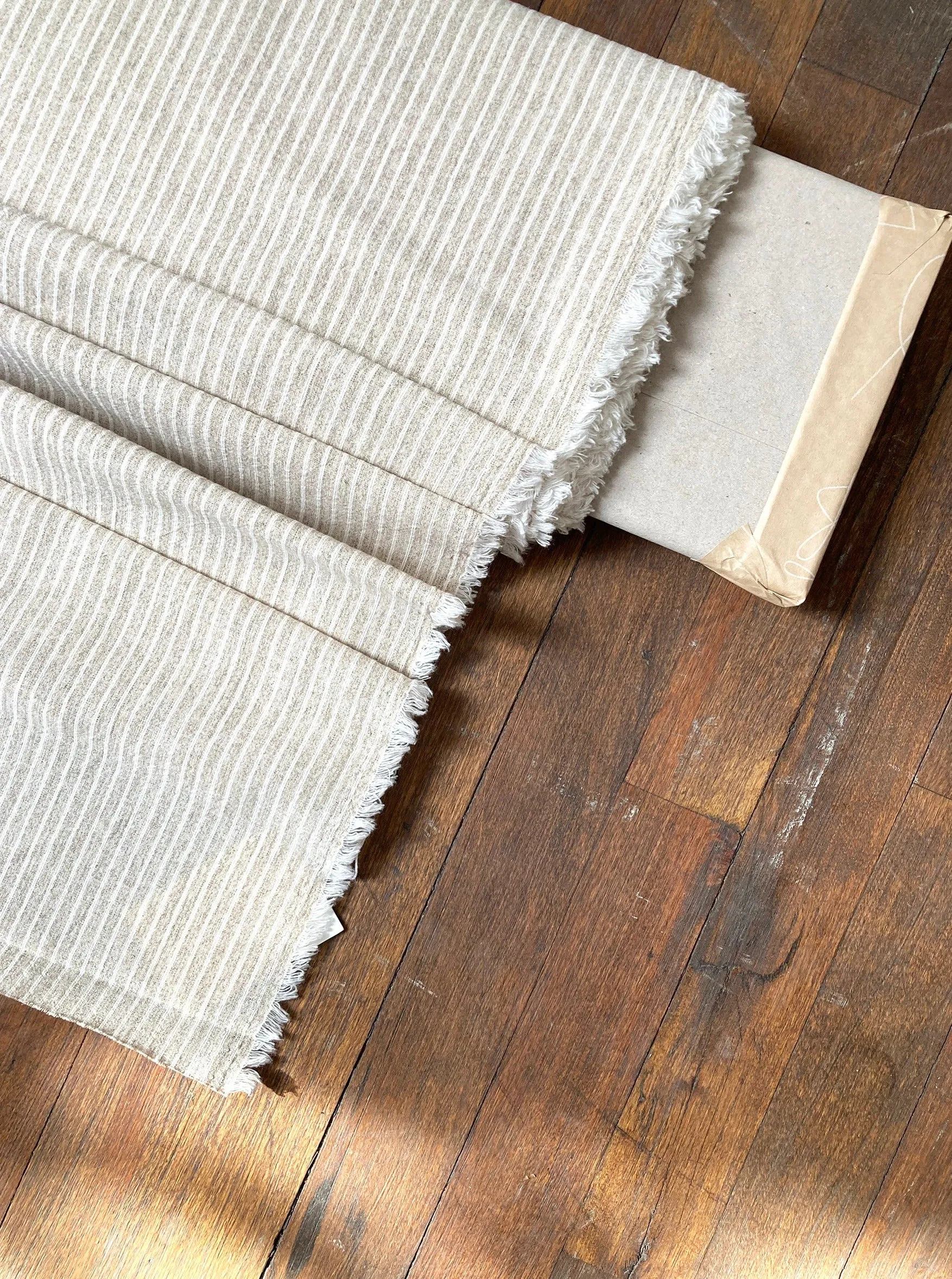 Beige linen with cream stripes, by the half meter sold by atelier b