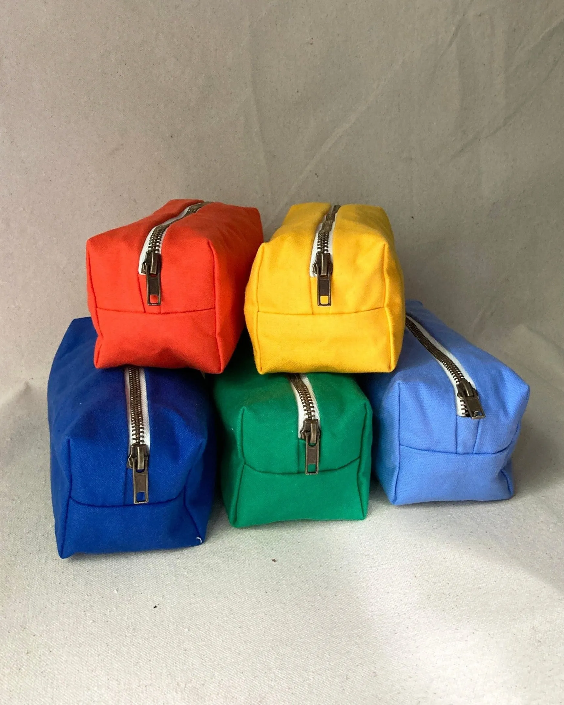 Pencil case, solid colours sold by atelier b