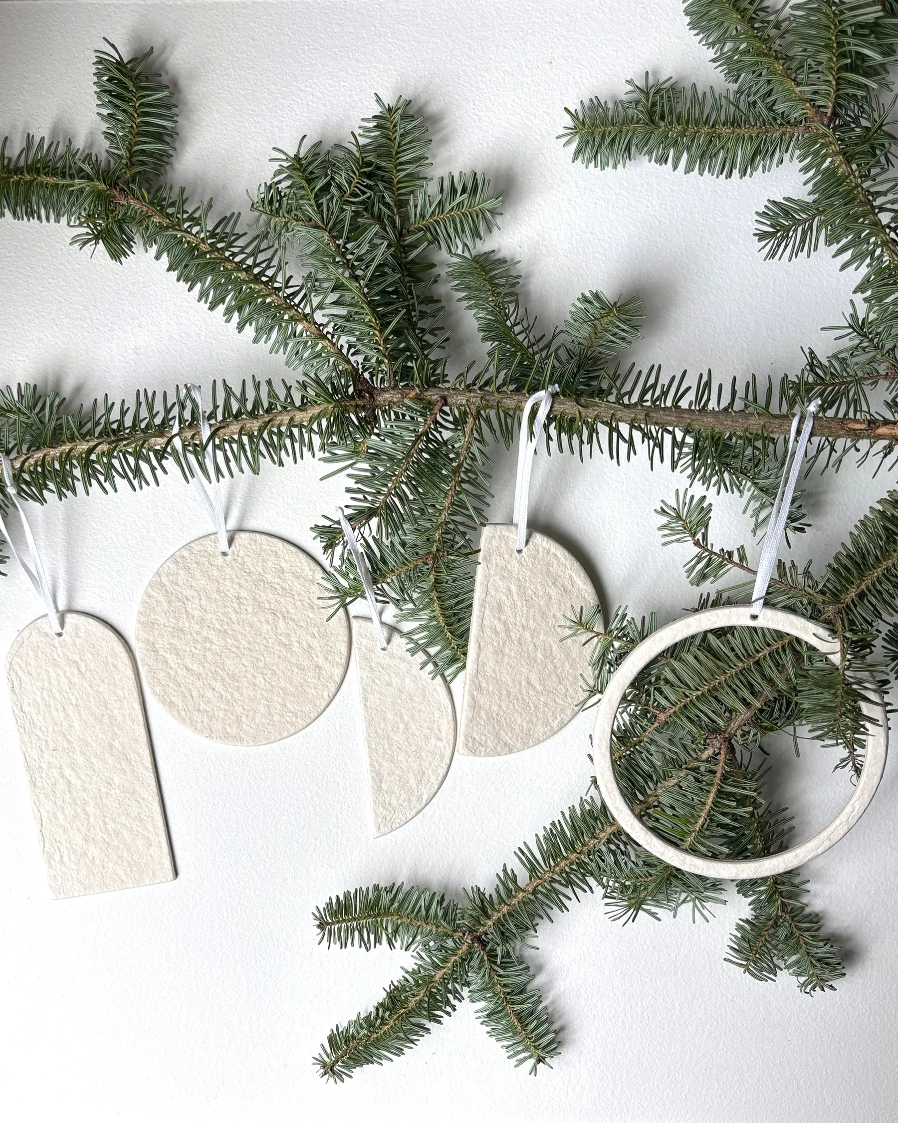 Hanging ornament, circular economy collection sold by atelier b