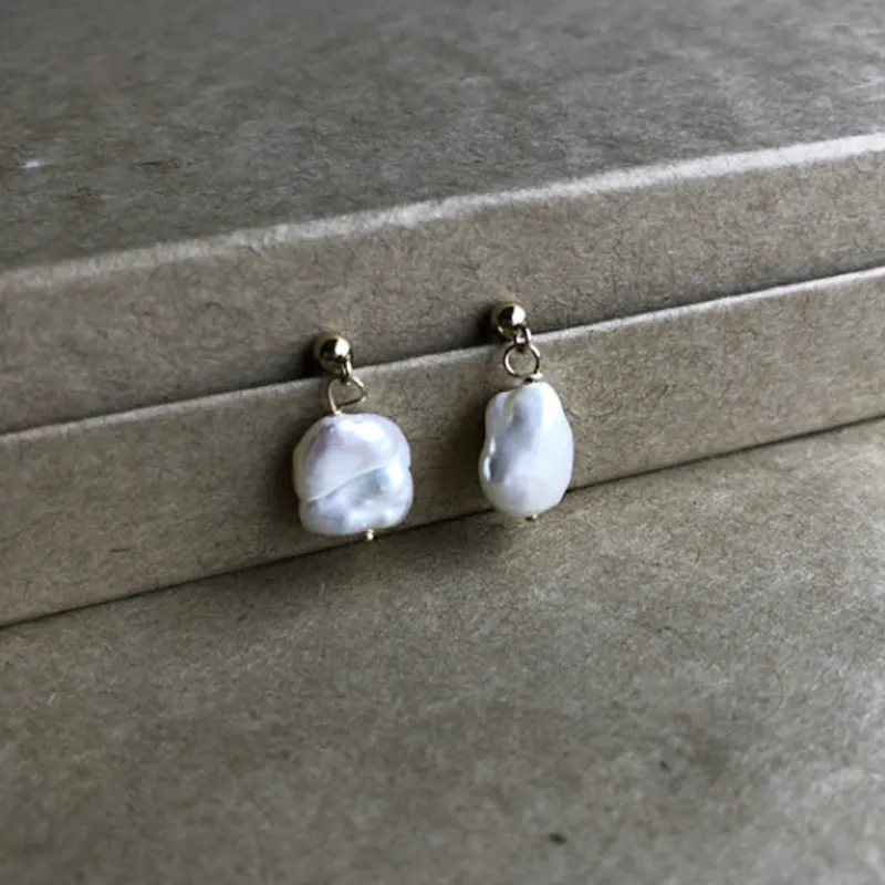 Naked Sage - Baroque Pearl Earrings (Silver & Gold) sold by Anne Mulaire